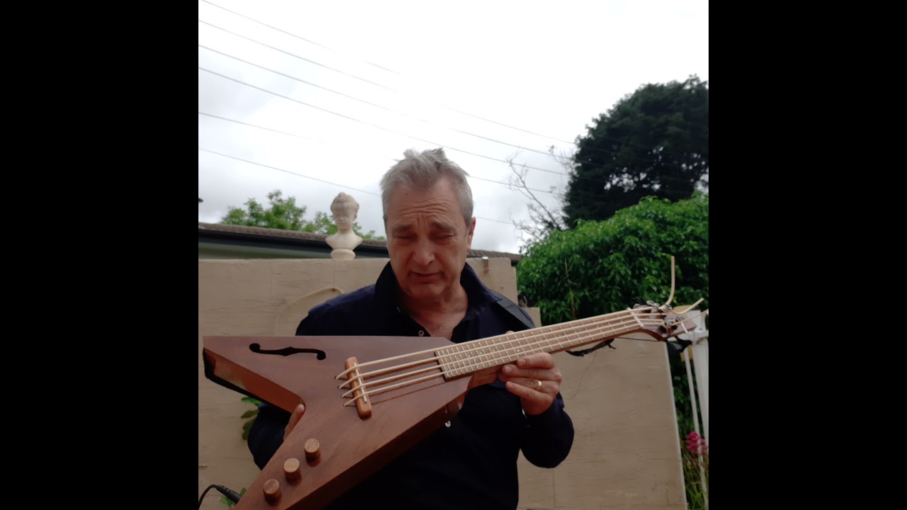 Demo of an acoustic electric V pattern bass ukulele YouTube