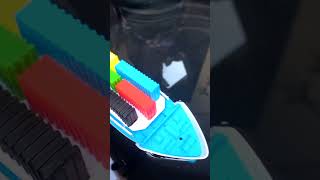 floating a cargo ship model on water