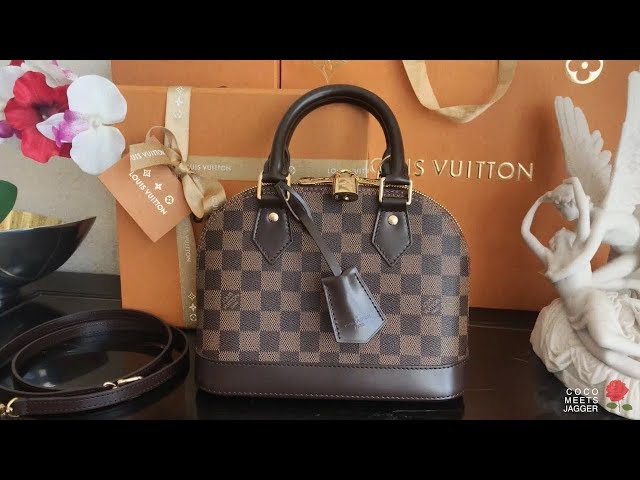 Unboxing reveal of Louis Vuitton alma bb handbag pink jungle dots