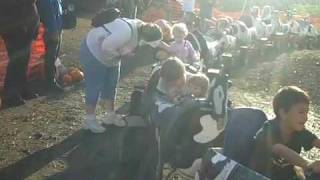 Nia and Ruby taking a Cow ride at the Pumpkin Patch