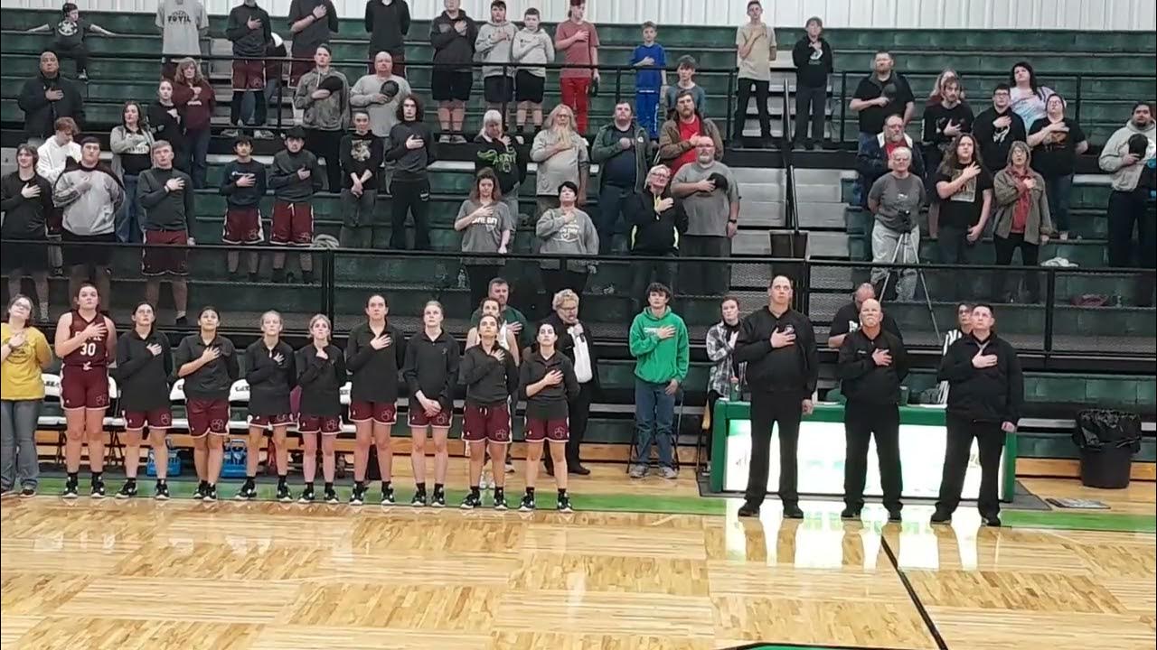 Chelsea_OK High School Student sings the national anthem at basketball