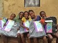 Children get School Bags in Kliptown, Soweto - Ilan Ossendryver - Photojournalist