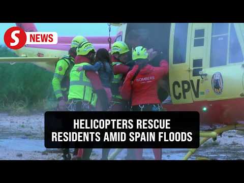 Spanish rescue teams evacuate residents stranded by heavy rains