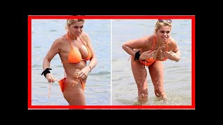 Danniella Westbrook Nearly Flashes To The Beach As She Readjusts Her Bikini Bottoms On Holiday
