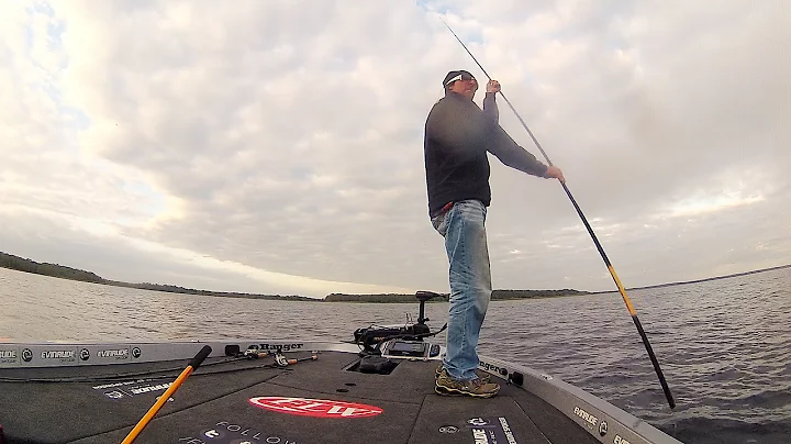 Wesley Strader snags a line with a fish and pole s...