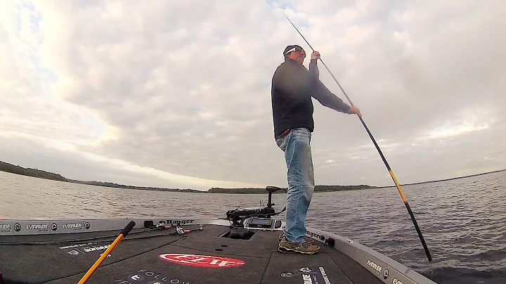 Wesley Strader snags a line with a fish and pole s...