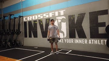 Dumbbell Suitcase Forward Lunge