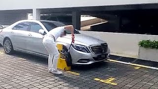 Datuk Businessman In Jelutong Clamping Incident Surrenders Himself