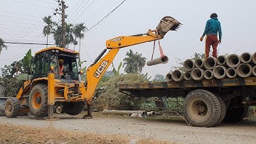 Backhoe Loader Unloading Culvert Pipe From Low Bed Truck - JCB Video