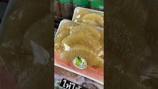 Street Food in Bangkok sell Sweet pomelo 70thb per pack at traditionel coffee shop