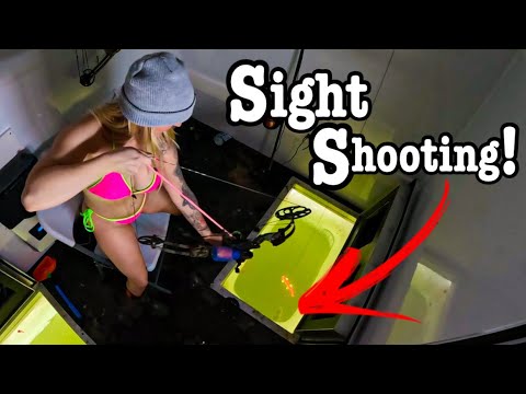 Bikini Bowfishing/Spearing through the Ice for Unexpected MONSTERS!!! (This was CRAZY!!)