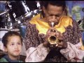 Eagle Eye Cherry, 5, yawns over dad Don mid-show