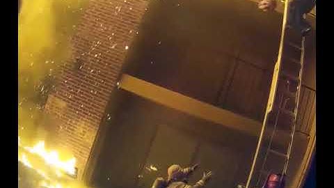 Dramatic video shows firefighter catch child thrown from 3rd floor during raging fire