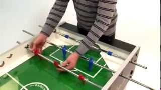Garlando foosball table assembly with outgoing rods