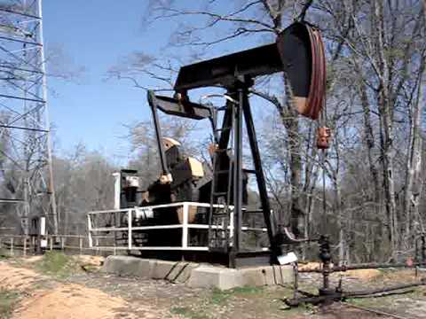 A oil well with a Lufkin 114-133-54 pumpjack along the Sabine River in White Oak, Texas. 3/4/2007 Oil Pumper www.oilpumper.com Derek's Oilfield Photography http