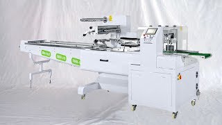 Syringe feeding horizontal flow wrapping machine film wrapper equipment آلة حقن المحاقن