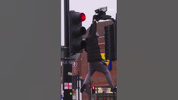 Vandal attacks Ulez camera in broad daylight