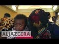 Gambian migrants return home from Libya