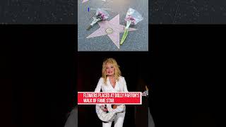 Fans lay flowers at Dolly Partons Walk of Fame star