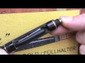 How a pushbutton fountain pen works