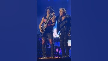 Iconic Rock Duo: Axl Rose and Slash Share Epic Onstage Moment