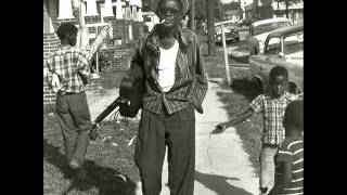 Video voorbeeld van "Lightnin' Hopkins - It's A Sin To Be Rich, It's A Low-Down Shame To Be Poor"