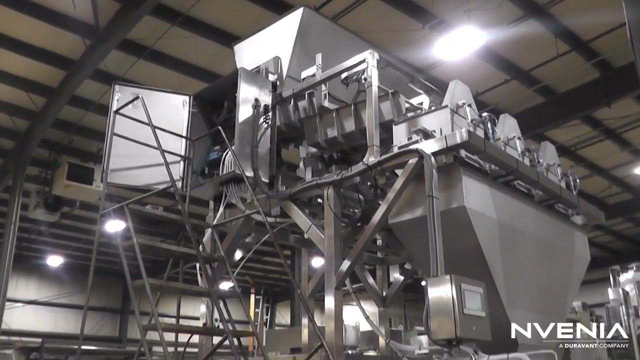 Bulk Box Filling Candy Corn with an OHLSON Brand Linear Scale