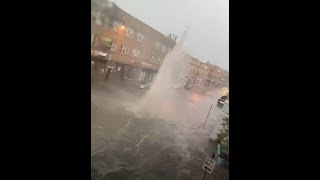 Severe flooding in Chicago's Albany Park neighborhood sends water jetting into air