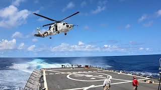 SH-60 Seahawk helicopter Landing on War Ship