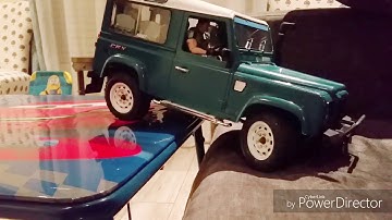 Rc Land Rover defender 90 MST CFX indoor sofa action.