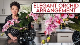 Creating a Beautiful Orchid Arrangement in a Tall Rounded Vase