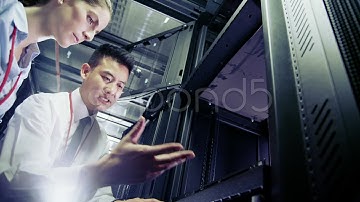 It Engineers Working In A Data Center. Stock Footage