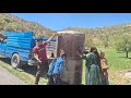 Rasuls help to his wife and children in preparing a water tanker