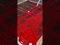 Red coating revives steel grating, turning bridge cover panels into bold structures with vivid charm