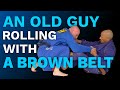 An Old Guy Rolling with a Brown Belt