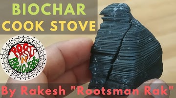 Students making a biochar cook stove during a Permaculture Design Course at Suderbyn Eco Village