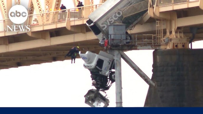 Crew Rescued Semi Truck Driver Dangling From Bridge