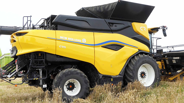 New Holland CR11 Harvesting Wheat with 50 ft. Wide MacDon FD250 Header