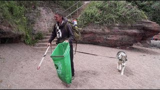 Wayne Dixon & Koda litter pick the UK coastline