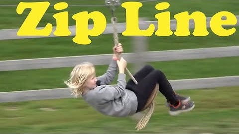 Zip-line, zip-wire, flying fox, or death slide quickly carries rider via an overhead pulley