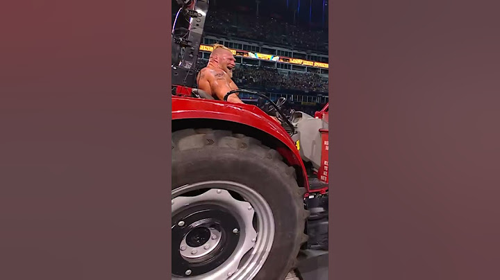 Brock Lesnar lifted the ring with a tractor and sent Roman Reigns FLYING! #Short