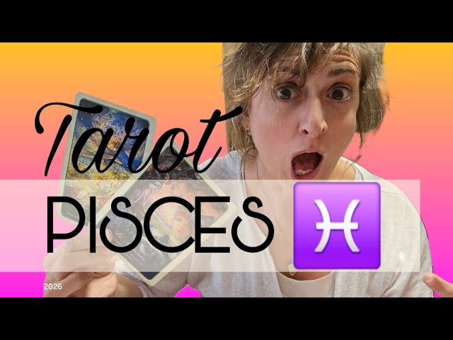 A tarot card reader holding up tarot cards during a tarot card reading