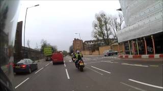 Close call unobservant driver almost takes out biker