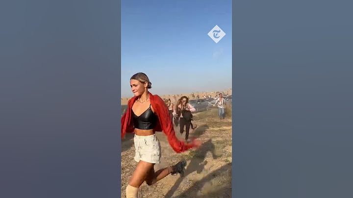 Israeli rave goers run for their lives when Hamas paraglide in and start shooting