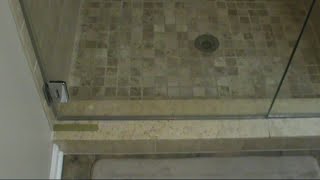 How to fix your leaking frameless shower door with a urethane dam.