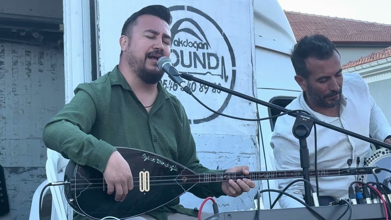 ÖZKAN DURAKOĞLU SARILARA BOYAMIŞSIN SAÇINI