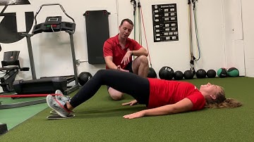 Band Resisted Leg Curls using sliders