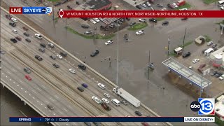 SkyEye13 images show cars driving through flooded roadway near IH-45 at Mount Houston