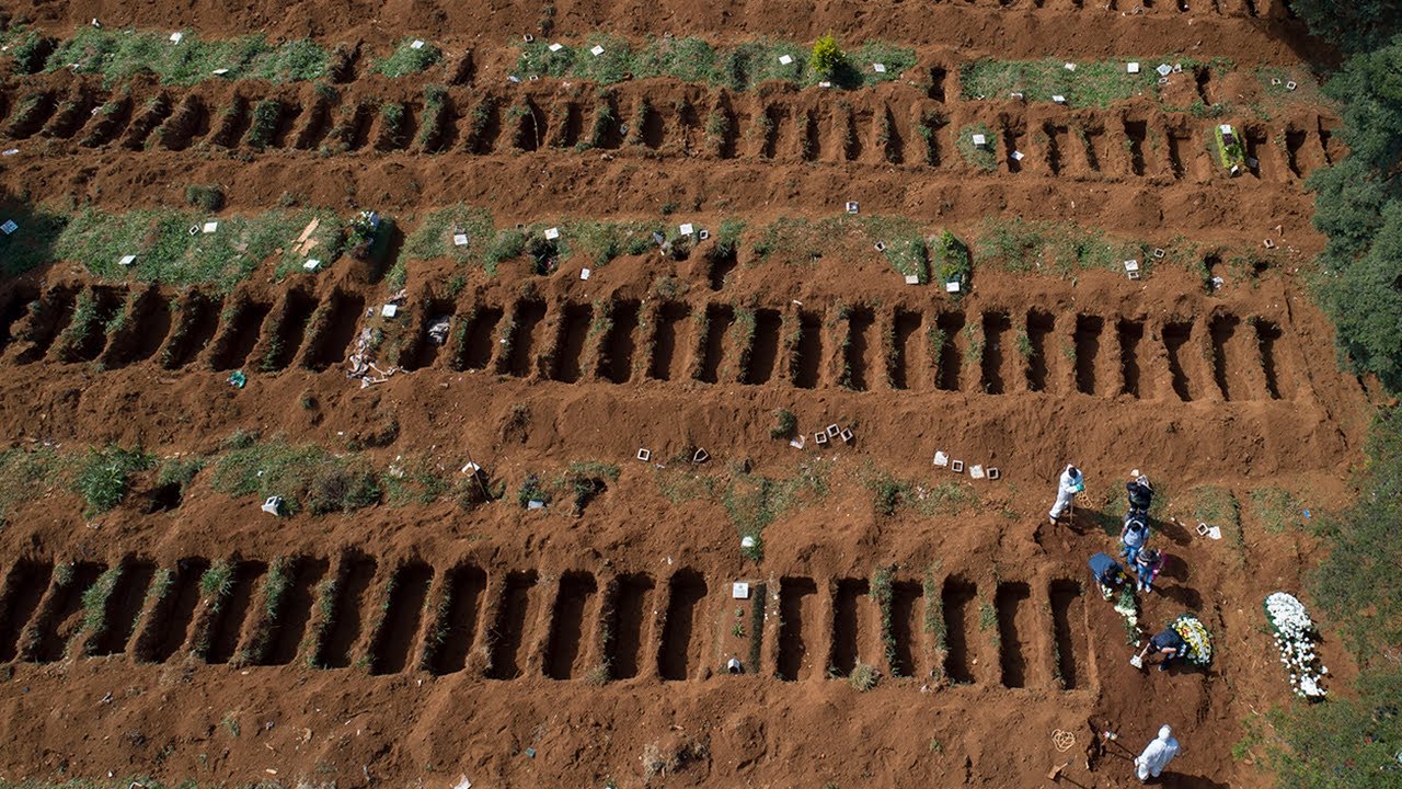 Bolsonaro under fire as mass graves dug in coronavirus hit Brazil ...