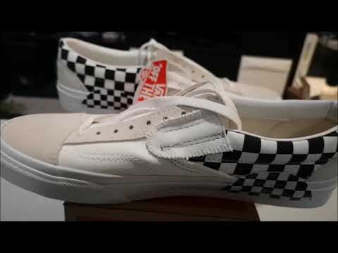 checkerboard slip on cap vans